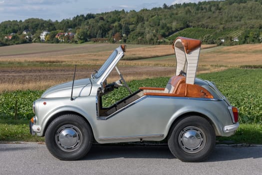 Oldtimer Puch 500D,modified Sacher,year of construction 1974,2 cylinders,displacement 493 ccm,hp 16,110 km/h,side view left