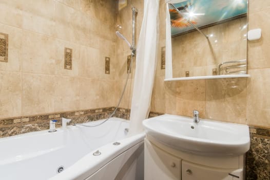 Russia, Moscow- July 16, 2019: interior room apartment. standard repair decoration in hostel. bathroom, sink, decoration elements, toilet