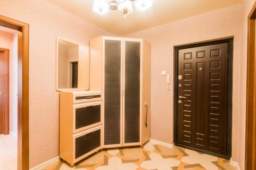 Russia, Moscow- July 16, 2019: interior room apartment. standard repair decoration in hostel. room doors, repair corridor