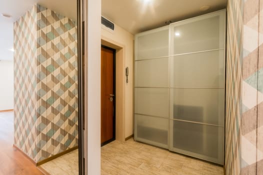 Russia, Moscow- July 16, 2019: interior room apartment. standard repair decoration in hostel. room doors, repair corridor