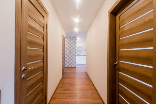 Russia, Moscow- July 16, 2019: interior room apartment. standard repair decoration in hostel. room doors, repair corridor