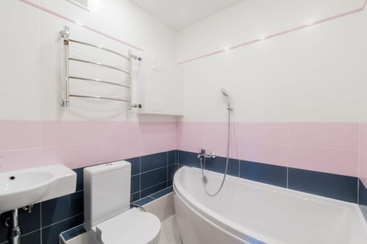 Russia, Moscow- July 16, 2019: interior room apartment. standard repair decoration in hostel. bathroom, sink, decoration elements, toilet