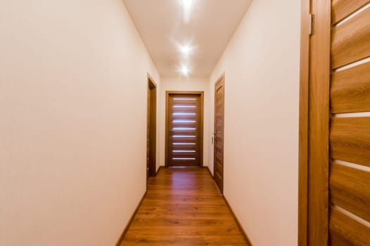 Russia, Moscow- July 16, 2019: interior room apartment. standard repair decoration in hostel. room doors, repair corridor