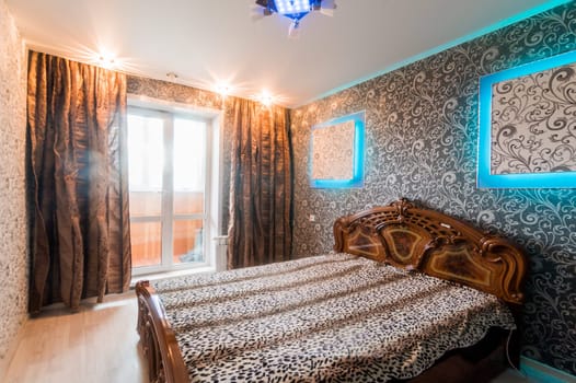 Russia, Moscow- July 16, 2019: interior room apartment. standard repair decoration in hostel. bedroom with bed