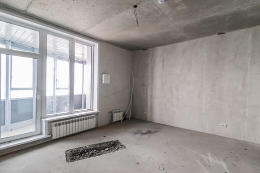 Russia, Moscow- July 16, 2019: interior room. rough repair for self-finishing. interior decoration, bare walls of the room, stage of construction