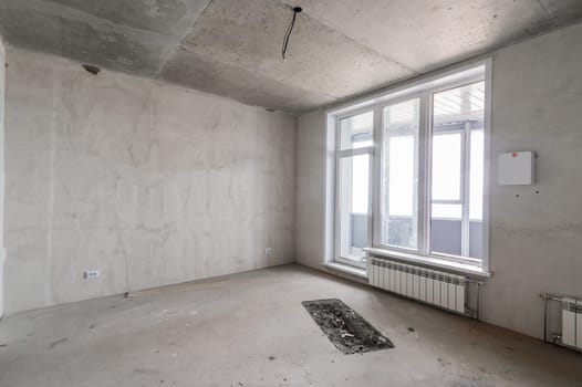 Russia, Moscow- July 16, 2019: interior room. rough repair for self-finishing. interior decoration, bare walls of the room, stage of construction