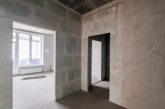 Russia, Moscow- July 16, 2019: interior room. rough repair for self-finishing. interior decoration, bare walls of the room, stage of construction