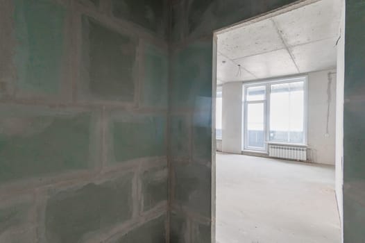 Russia, Moscow- July 16, 2019: interior room. rough repair for self-finishing. interior decoration, bare walls of the room, stage of construction