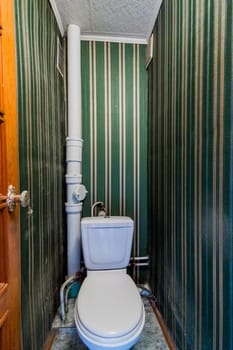 Russia, Moscow- July 16, 2019: interior room apartment. standard repair decoration in hostel. bathroom and toilet