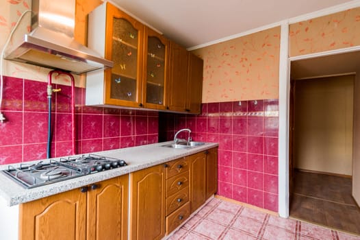 Russia, Moscow- July 16, 2019: interior room apartment. standard repair decoration in hostel. kitchen, dining area