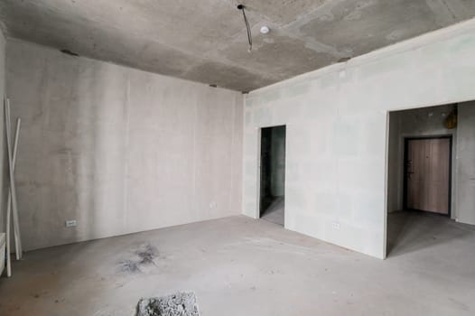 Russia, Moscow- July 16, 2019: interior room. rough repair for self-finishing. interior decoration, bare walls of the room, stage of construction
