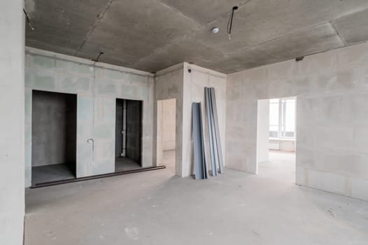 Russia, Moscow- July 16, 2019: interior room. rough repair for self-finishing. interior decoration, bare walls of the room, stage of construction