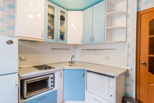 Russia, Moscow- July 16, 2019: interior room apartment. standard repair decoration in hostel. kitchen, dining area