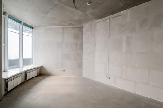 Russia, Moscow- July 16, 2019: interior room. rough repair for self-finishing. interior decoration, bare walls of the room, stage of construction