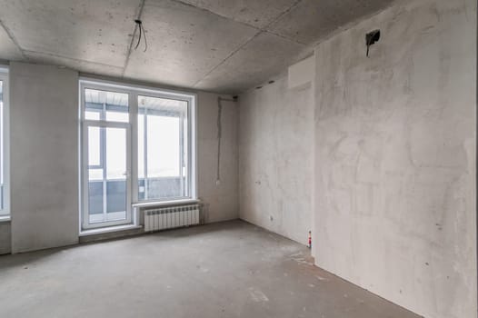 Russia, Moscow- July 16, 2019: interior room. rough repair for self-finishing. interior decoration, bare walls of the room, stage of construction