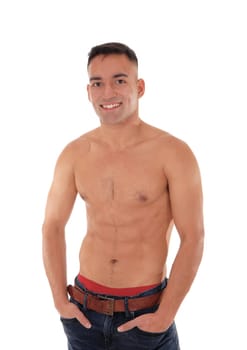 A handsome young east Indian man standing shirtless and smiling.in jeans with red underwear showing, isolated for white background.