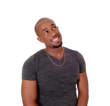 A close up image of a very happy young African American man with .his hands behind his head wearing a hat, isolated for white background.