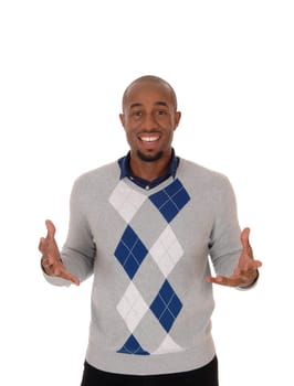 A smiling young African American man standing with his hands.open making an inviting pose, isolated for white background.