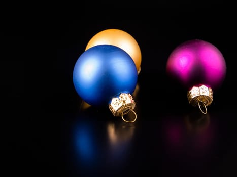 Christmas Christmas toys on a black background. New Year. Place for text. Background image.