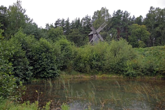 Historic rural wood Baltic windmill in Estonia
