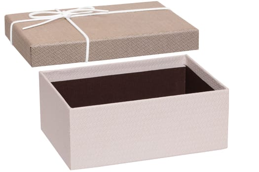 Gift box isolated. Close-up of a beige opened present or gift box with white ribbon bow isolated on a white background. Birthday, valentine, anniversary or other holidays. Macro photograph.