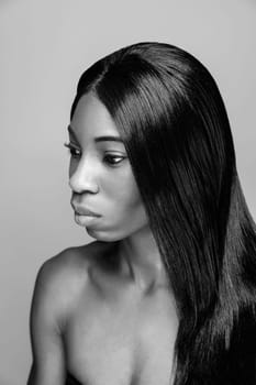 Face of an young black beauty in black and white
