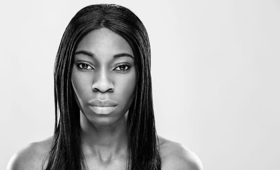 Face of an young black beauty in black and white