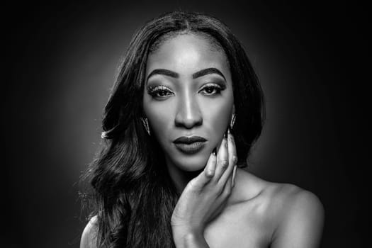 Face of an young black beauty in black and white
