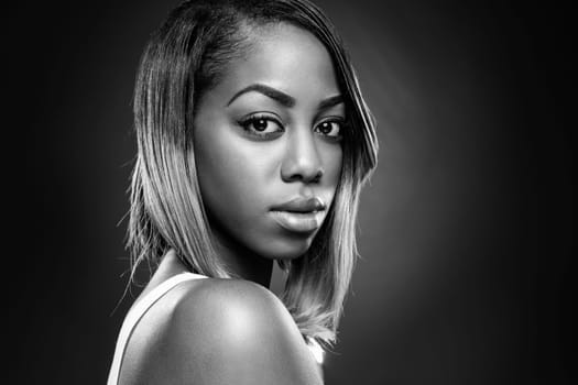 Face of an young black beauty in black and white