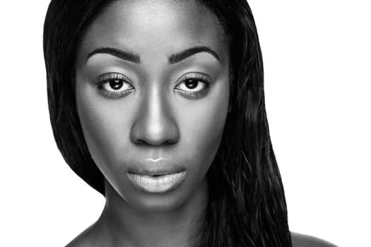Face of an young black beauty in black and white