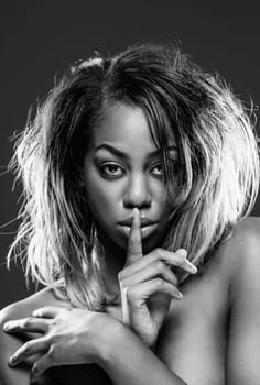 Face of an young black beauty in black and white