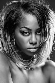 Face of an young black beauty in black and white