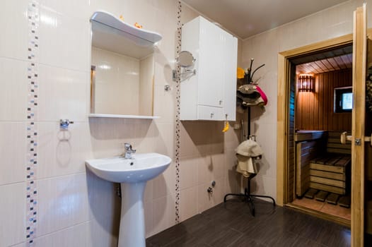Russia, Moscow- July 23, 2019: interior room apartment. standard repair decoration in hostel. bathhouse, sauna