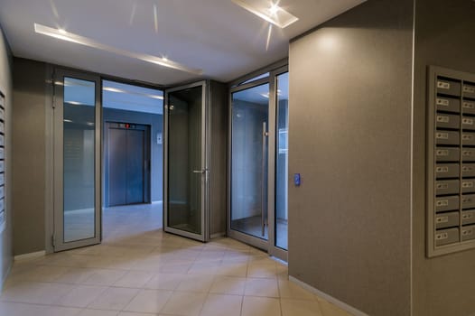 Russia, Moscow- July 08, 2019: interior room apartment. standard repair decoration in hostel. Russia, Moscow- July 08, 2019: interior room apartment. standard repair decoration in hostel. bright modern car garage. public place, staircase