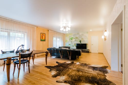 Russia, Moscow- July 23, 2019: interior room apartment. standard repair decoration in hostel. living room with sofa