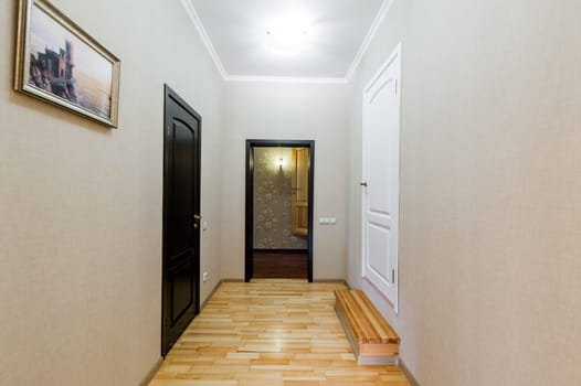 Russia, Moscow- July 23, 2019: interior room apartment. standard repair decoration in hostel. room doors, repair corridor