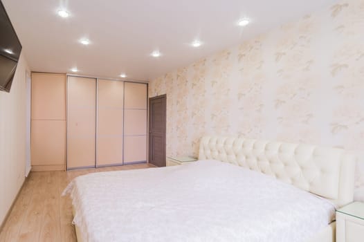 Russia, Moscow- July 23, 2019: interior room apartment. standard repair decoration in hostel. bedroom with bed