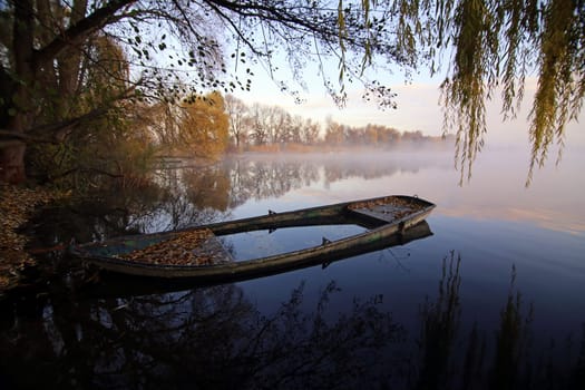 Boat on the shore of the Erlichsee near Oberhausen-Rheinhausen