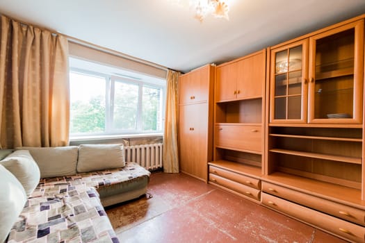 Russia, Moscow- July 23, 2019: interior room apartment. standard repair decoration in hostel. decrepit old careless not modern setting. cosmetic repairs required