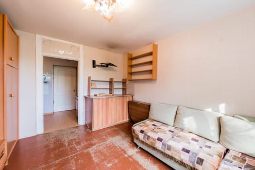 Russia, Moscow- July 23, 2019: interior room apartment. standard repair decoration in hostel. decrepit old careless not modern setting. cosmetic repairs required