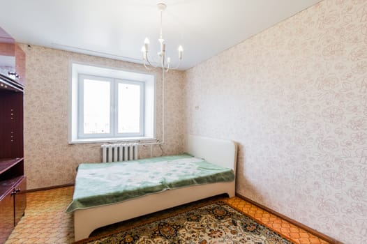 Russia, Moscow- July 23, 2019: interior room apartment. standard repair decoration in hostel. decrepit old careless not modern setting. cosmetic repairs required