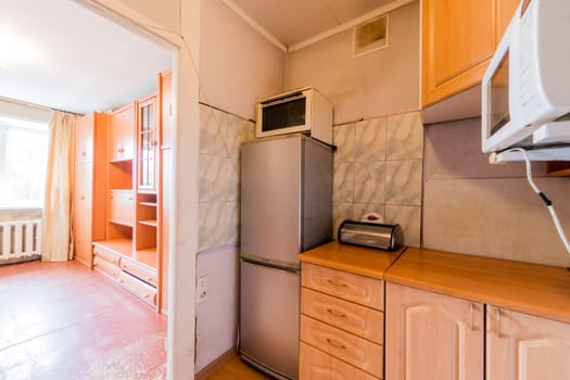 Russia, Moscow- July 23, 2019: interior room apartment. standard repair decoration in hostel. decrepit old careless not modern setting. cosmetic repairs required