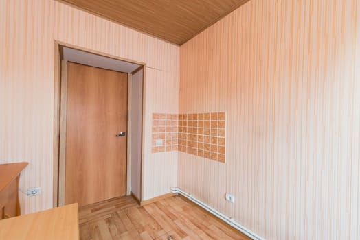 Russia, Moscow- July 25, 2019: interior room apartment. standard repair decoration in hostel. room doors, repair corridor