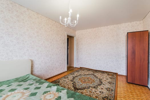 Russia, Moscow- July 23, 2019: interior room apartment. standard repair decoration in hostel. decrepit old careless not modern setting. cosmetic repairs required