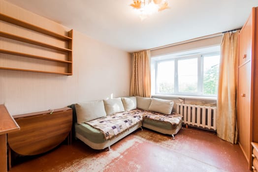 Russia, Moscow- July 23, 2019: interior room apartment. standard repair decoration in hostel. decrepit old careless not modern setting. cosmetic repairs required