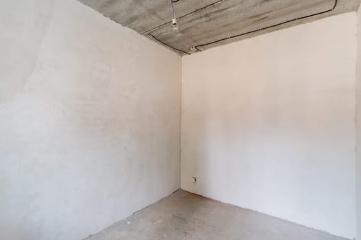 Russia, Moscow- July 23, 2019: interior room apartment. rough repair for self-finishing. interior decoration, bare walls of the room, stage of construction