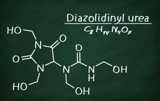 Structural model of Diazolidinyl urea on the blackboard.