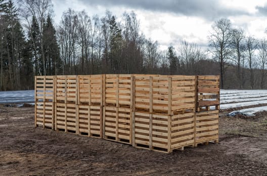 Empty wooden boxes loaded in the pile