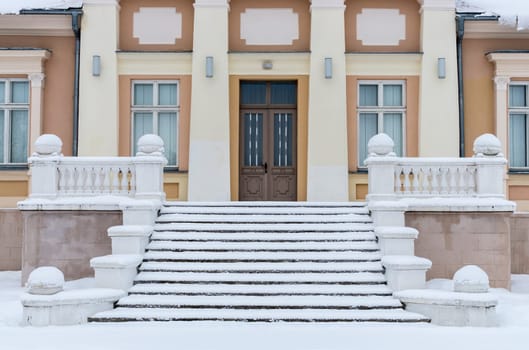Winter snow on medieval staircase in Renavas, Lithuania
