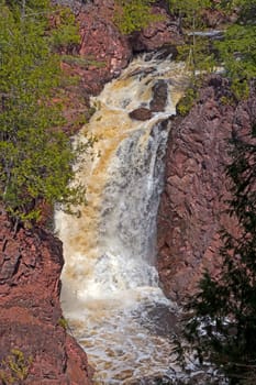 Roaring Copper Falls Hidden in the Rocks in Copper Falls State Park in Wisconsin